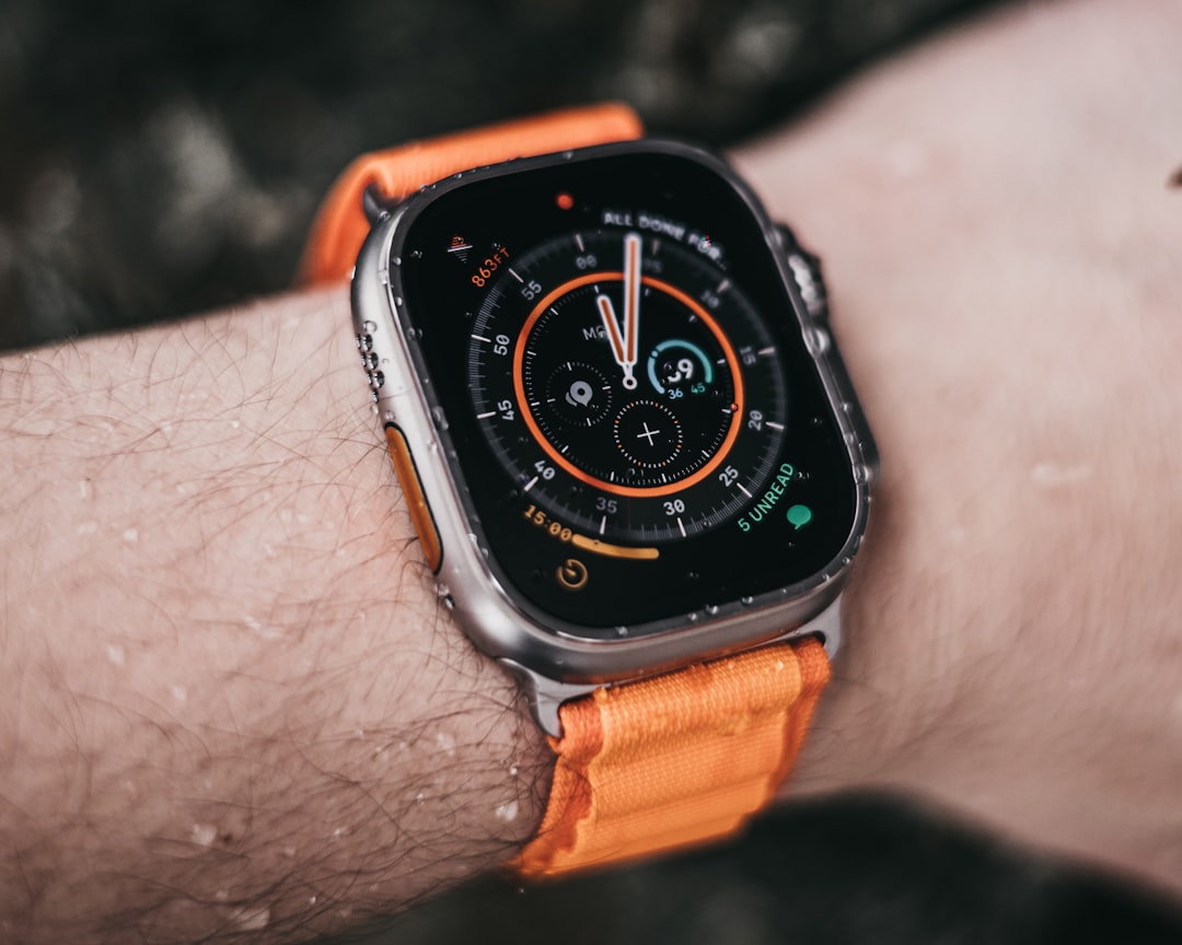 Apple Watch Ultra with orange band, illustrative image
