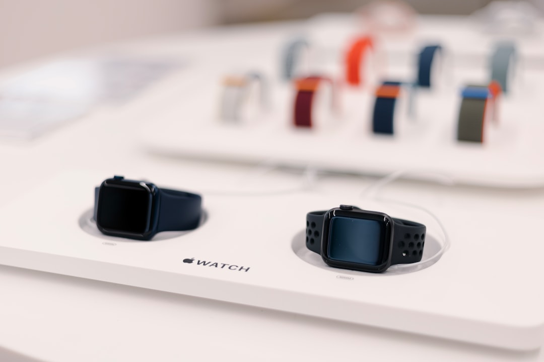 Smartwatches on a table, illustrative image for Apple Watch battery and charging coverage