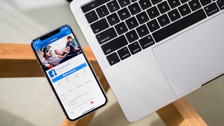 Smartphone and laptop representing Australia’s proposed Digital Duty of Care and social media algorithm regulation