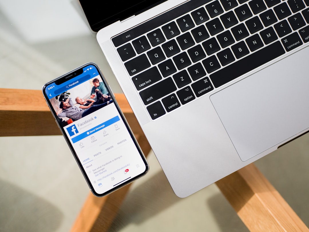 Smartphone and laptop representing Australia’s proposed Digital Duty of Care and social media algorithm regulation