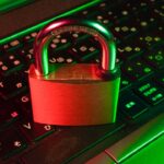 Laptop representing phishing emails and cybersecurity threats using invisible Unicode characters