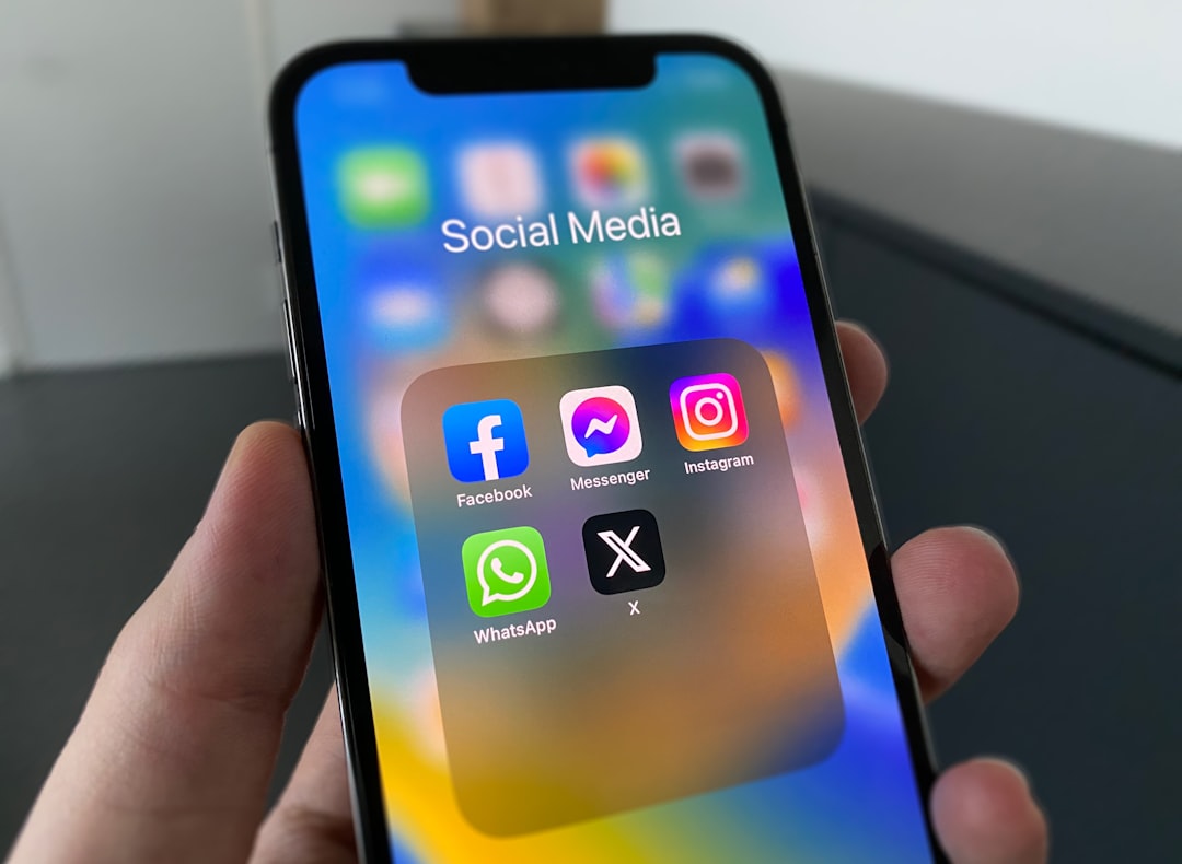 Smartphone displaying social media apps for Meta One subscription coverage
