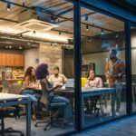 Microsoft employees collaborating as part of the company's AI transformation