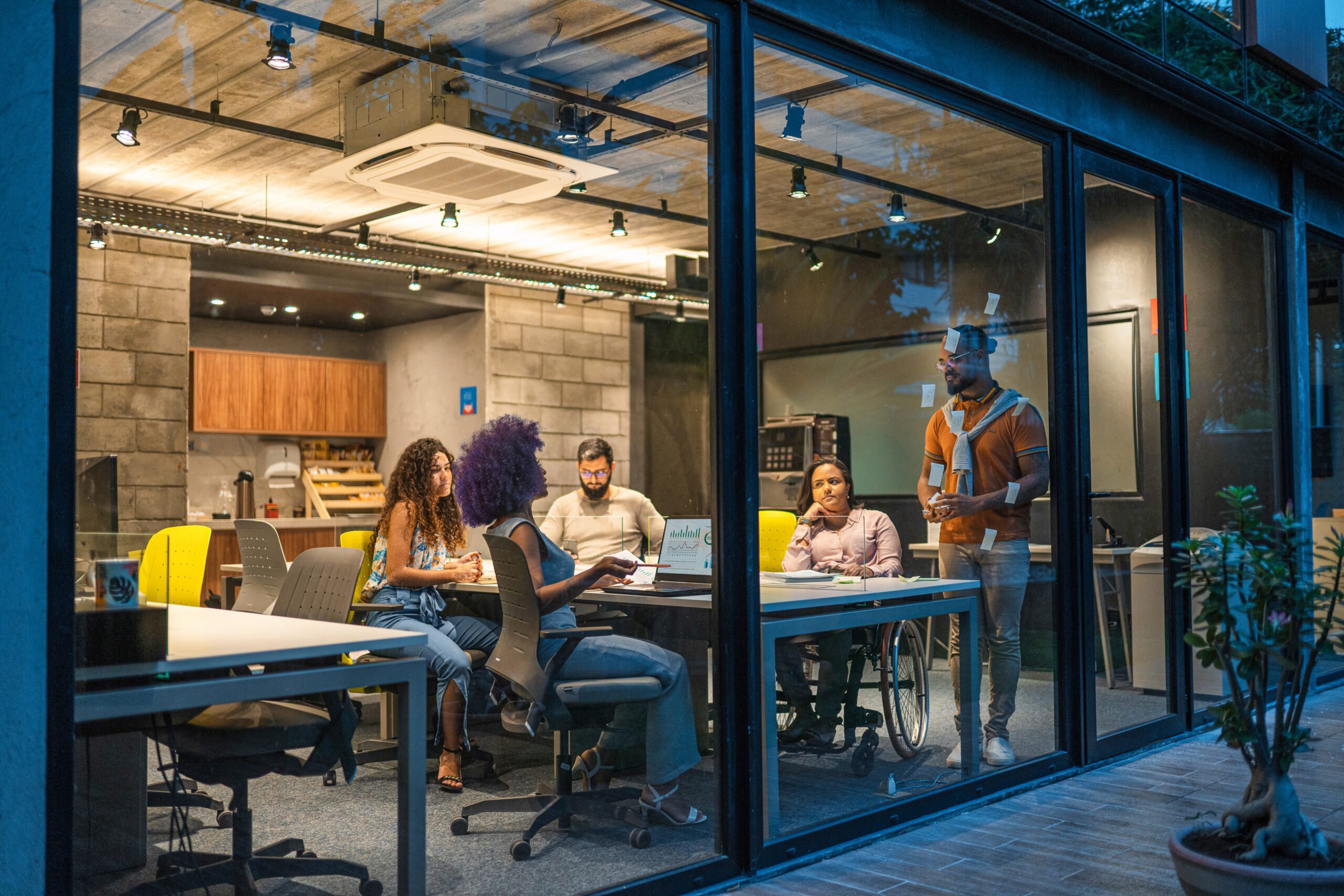 Microsoft employees collaborating as part of the company's AI transformation