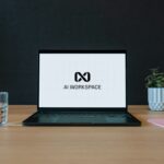Person using an AI-enabled laptop at work, illustrating Google's new Gemini agent for businesses