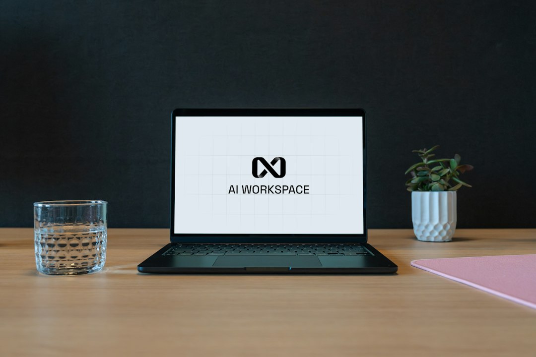 Person using an AI-enabled laptop at work, illustrating Google's new Gemini agent for businesses