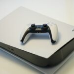 PlayStation 5 console and DualSense controller illustrating Sony QSSR AI upscaling